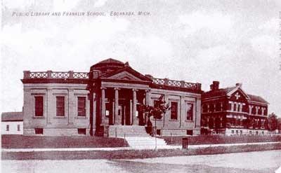 This is an old postcard with the Carnegie Library and Franklin Elementary School.